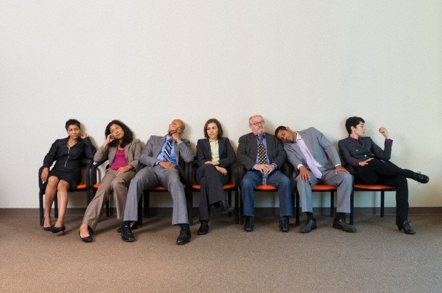 Business people sleeping in waiting area